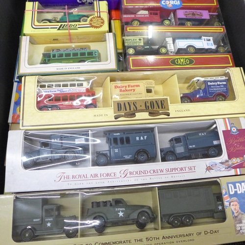 803 - A collection of Corgi, Matchbox and Lledo vehicles including anniversary sets for D-Day, Dambusters ... 