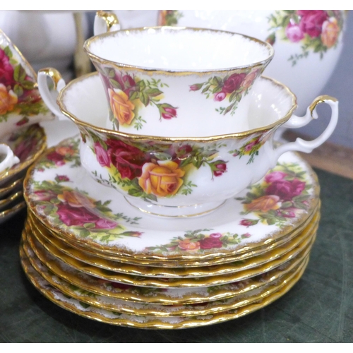 806 - A Royal Albert Old Country Roses coffee service, (lacking one saucer), tureen, ginger jar, four tea ... 