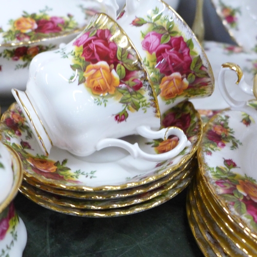 806 - A Royal Albert Old Country Roses coffee service, (lacking one saucer), tureen, ginger jar, four tea ... 