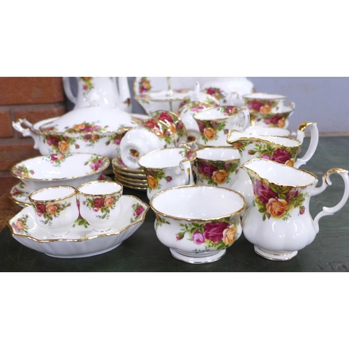 806 - A Royal Albert Old Country Roses coffee service, (lacking one saucer), tureen, ginger jar, four tea ... 