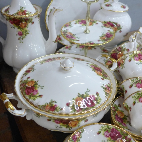 806 - A Royal Albert Old Country Roses coffee service, (lacking one saucer), tureen, ginger jar, four tea ... 