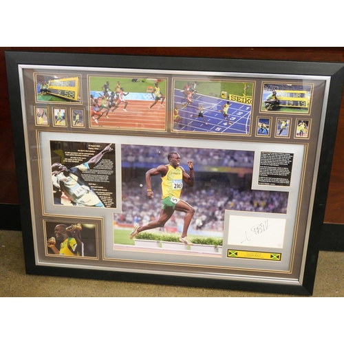 813 - Usain Bolt; a photograph display with signature of the 'World's Fastest Man' lower right, showing hi... 