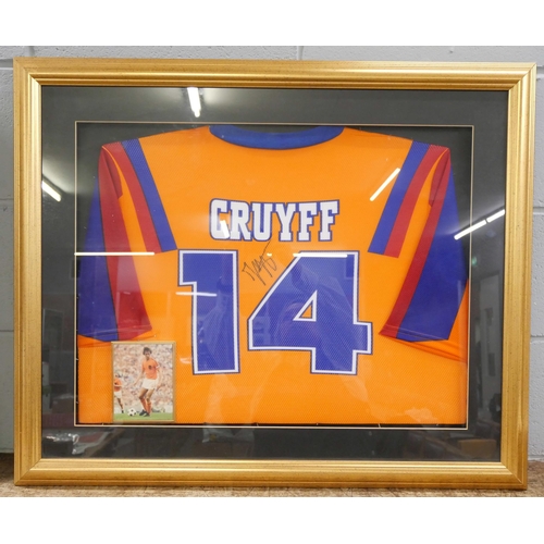 815 - Johan Cruyff; a 1999 Barcelona Cruyff tribute shirt, signed and framed for display, no CoA