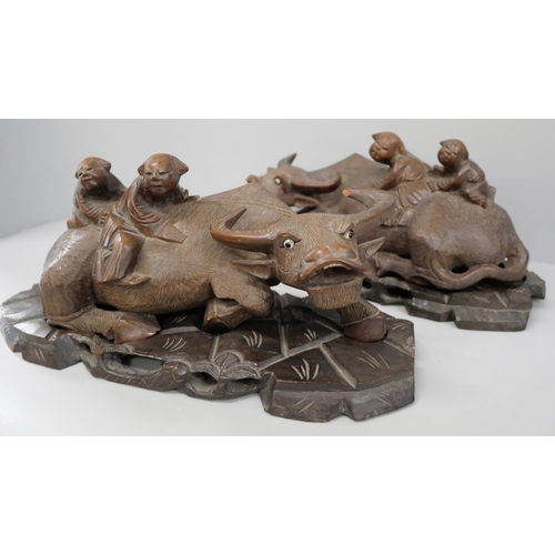 823 - Two circa 1900 carved water-buffalo figures, Chinese