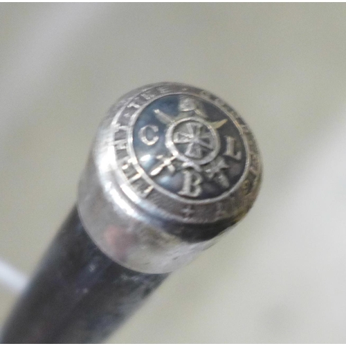 831 - A Victorian swagger stick, silver top Birmingham 1898, Fight The Good Fight