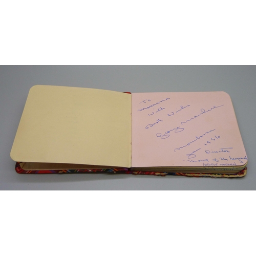 852 - A 1950s autograph album with signatures including Lionel Jeffries, Jim Reeves, Dickie Valentine, Chr... 