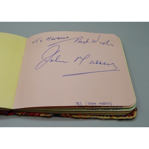 852 - A 1950s autograph album with signatures including Lionel Jeffries, Jim Reeves, Dickie Valentine, Chr... 