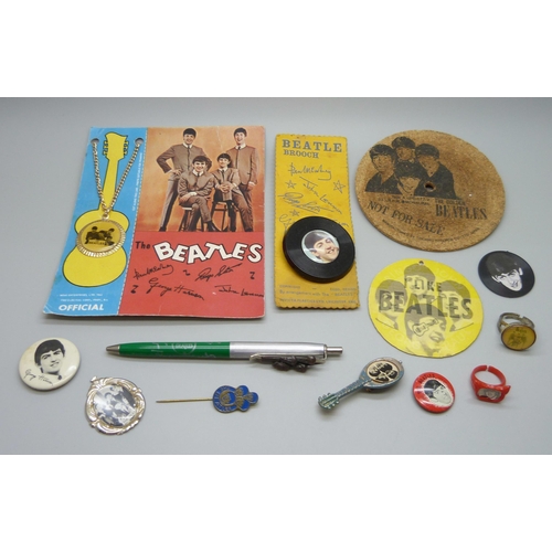 854 - The Beatles, a collection of badges, etc.