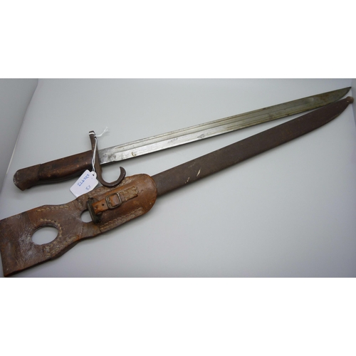 865 - A WWII Japanese Arisaka bayonet, type 30, with scabbard and frog