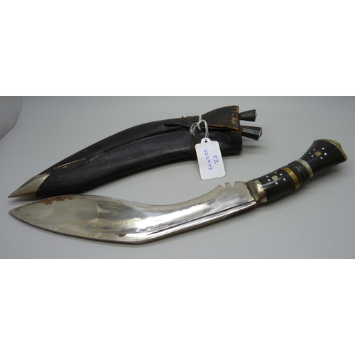 866 - A Kukri knife with sheath