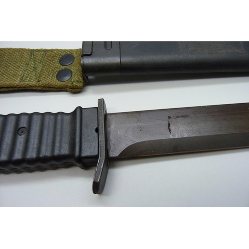 867 - A US Commando knife in scabbard