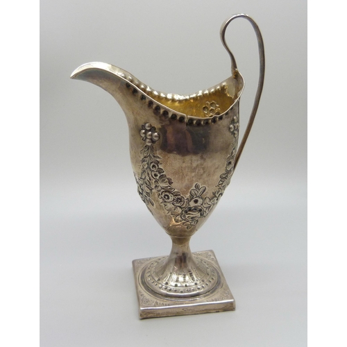 870 - A George III silver cream jug, London 1789, maker HB, 73g