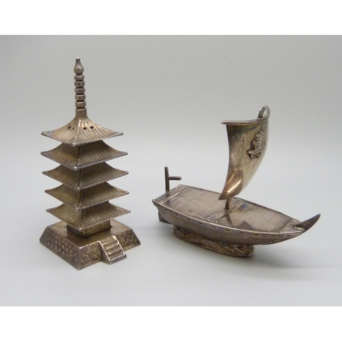 875 - A novelty sterling silver pepper pot in the form of a pagoda and a pepper in the form of a Chinese j... 