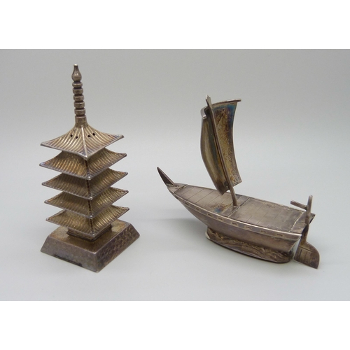 875 - A novelty sterling silver pepper pot in the form of a pagoda and a pepper in the form of a Chinese j... 