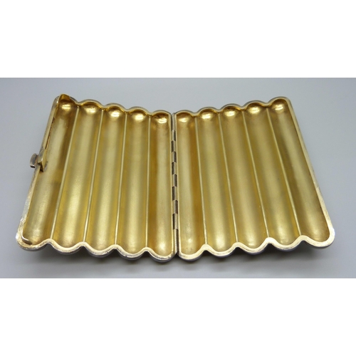 880 - A white metal cigar case with gilt interior, 159g, tests as silver, 8cm x 11cm