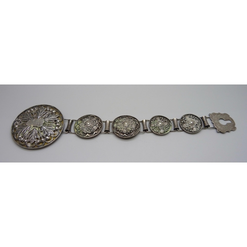 887 - A large Austro-Hungarian cuff bracelet, marked Kiralyi, tests as silver, 136.4g, large panel 67mm