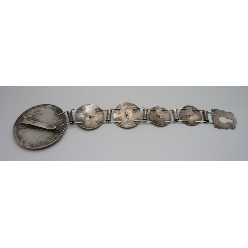 887 - A large Austro-Hungarian cuff bracelet, marked Kiralyi, tests as silver, 136.4g, large panel 67mm