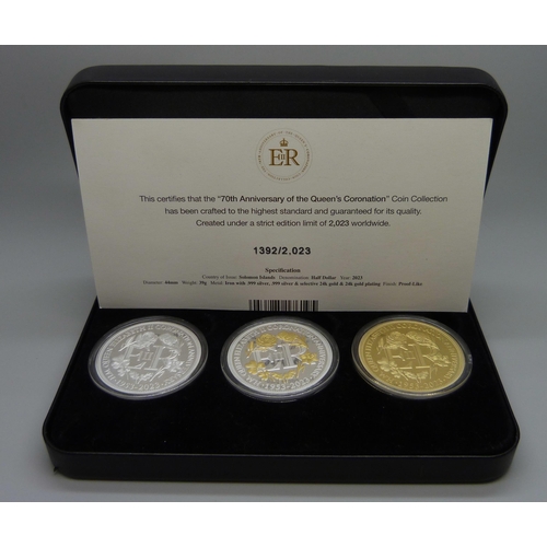 896 - Coins; The 70th anniversary of The Queen's Coronation Coin Collection, three Solomon Islands half-do... 