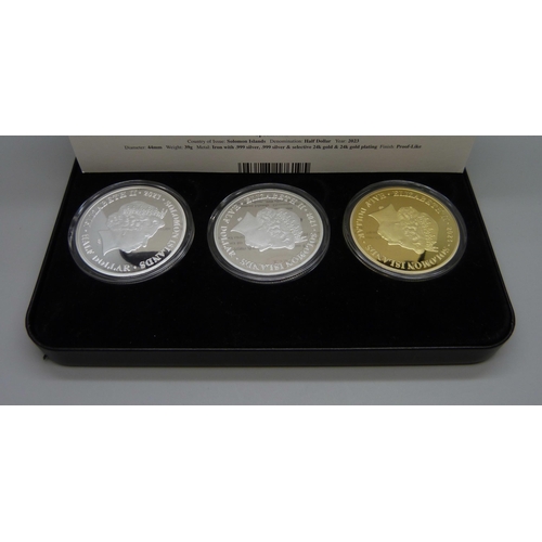 896 - Coins; The 70th anniversary of The Queen's Coronation Coin Collection, three Solomon Islands half-do... 