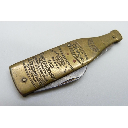 907 - A vintage advertising bottle opener/knife, 'Old Chateau Brandy', Sedgwick & Co., Cape Town