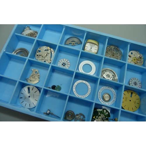 915 - A collection of watch dials including Seiko and other watch parts