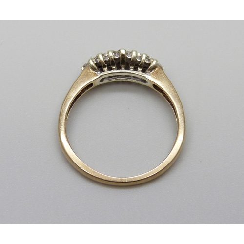 958 - A 9ct gold and diamond ring, 2.3g, L, lacking one diamond