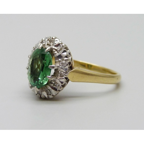 959 - An 18ct gold, diamond and green stone ring, 4.3g, K/L