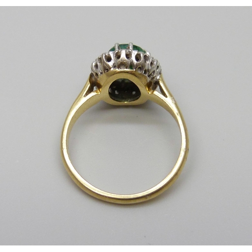 959 - An 18ct gold, diamond and green stone ring, 4.3g, K/L