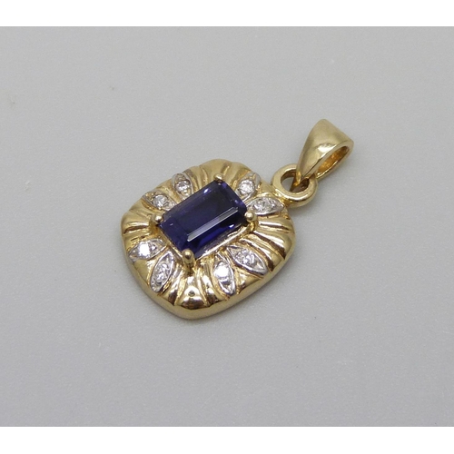 960 - A 9ct gold pendant, set with diamonds and a blue stone, 1.5g, 1cm wide