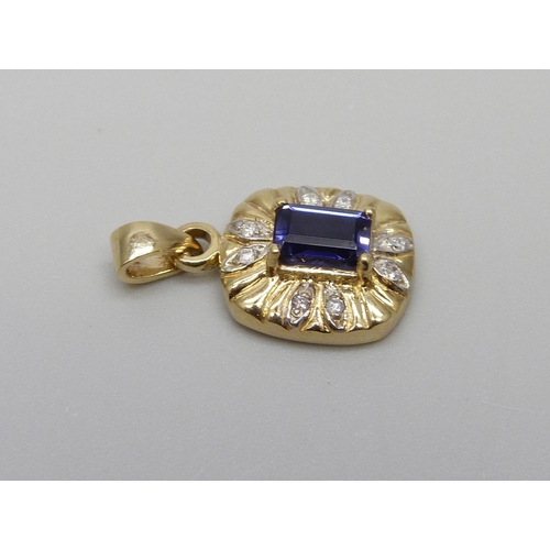 960 - A 9ct gold pendant, set with diamonds and a blue stone, 1.5g, 1cm wide