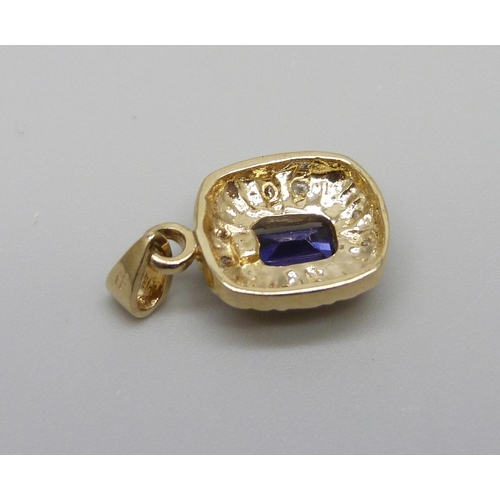 960 - A 9ct gold pendant, set with diamonds and a blue stone, 1.5g, 1cm wide