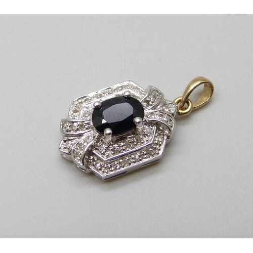 963 - A 9ct gold, sapphire and diamond pendant, 2.9g, 12mm wide