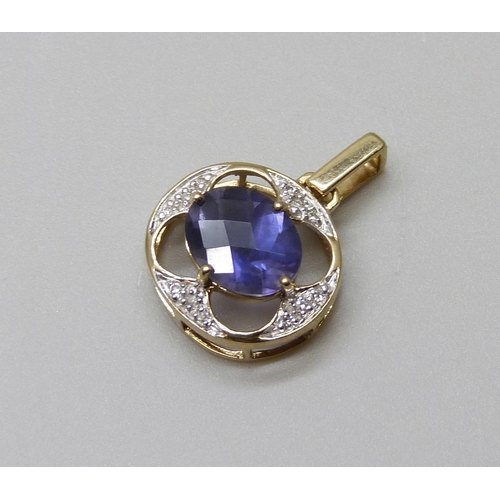 964 - A 9ct gold pendant, set with diamonds and a blue stone, 1.5g, 14mm wide