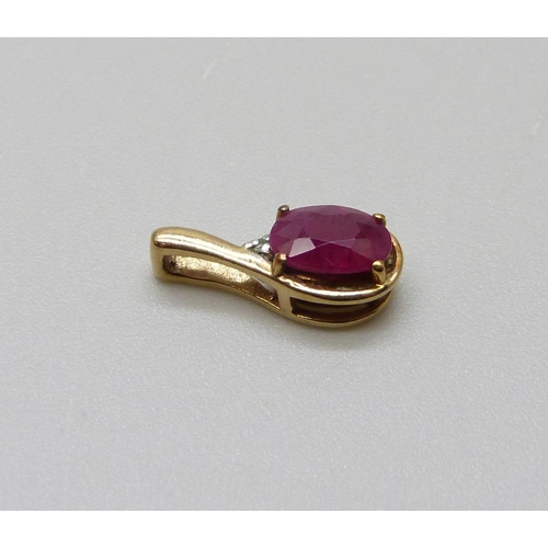 967 - A 9ct gold and ruby pendant, 0.5g