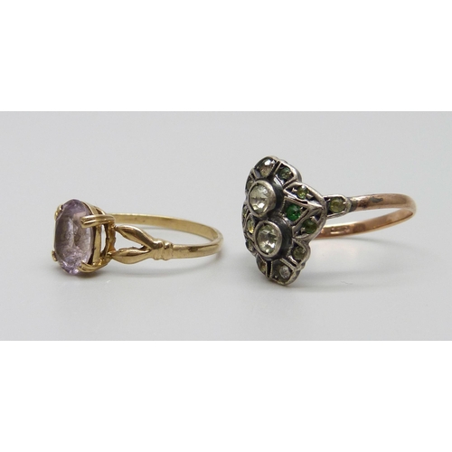 972 - A 9ct gold ring, 1.3g, and a 9ct gold and silver ring, sizes K and M