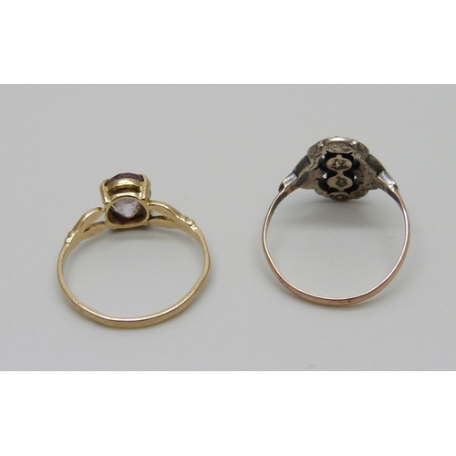 972 - A 9ct gold ring, 1.3g, and a 9ct gold and silver ring, sizes K and M