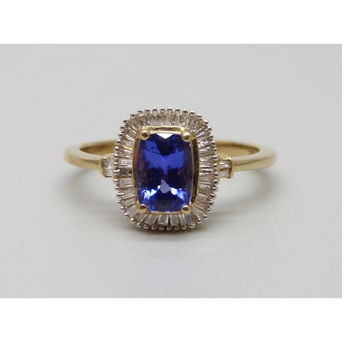 973 - A 9ct gold, tanzanite and diamond ring, 2.8g, O/P