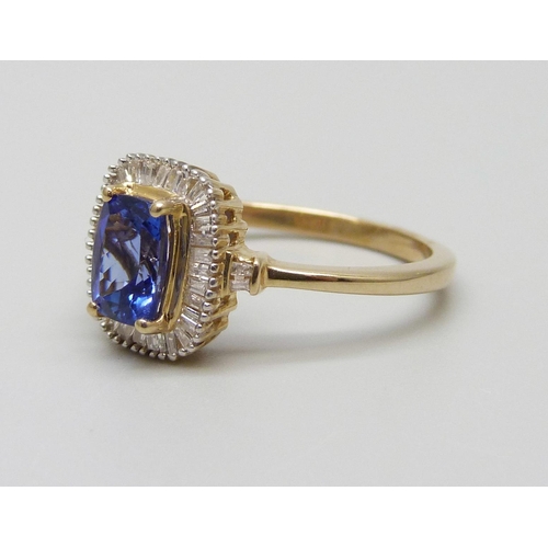 973 - A 9ct gold, tanzanite and diamond ring, 2.8g, O/P