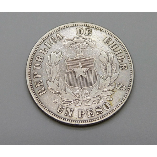 975 - An 1872 Chile one peso coin, Andean Condor with a claw on the shield, .900 silver, 24.7g