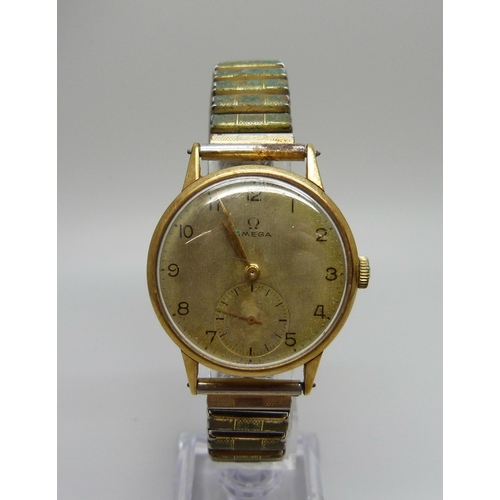 989 - A 1940's 18ct gold cased Omega wristwatch, the case back bears inscription dated 1945, 34mm case