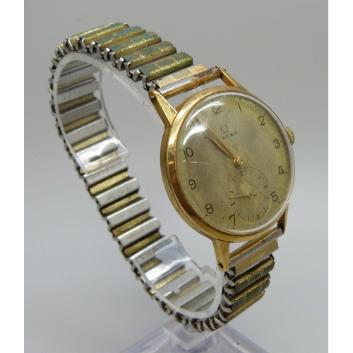 989 - A 1940's 18ct gold cased Omega wristwatch, the case back bears inscription dated 1945, 34mm case