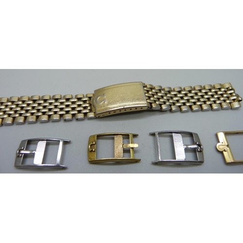 997 - Ten Omega wristwatch strap buckles, four a/f, and an Omega bracelet strap