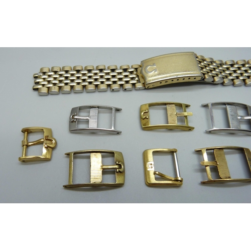 997 - Ten Omega wristwatch strap buckles, four a/f, and an Omega bracelet strap