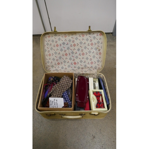 1113 - A large collection of bow ties, 15 boxed, 26 tied, 20 self tie and 5 clip-on, and a press **PLEASE N... 