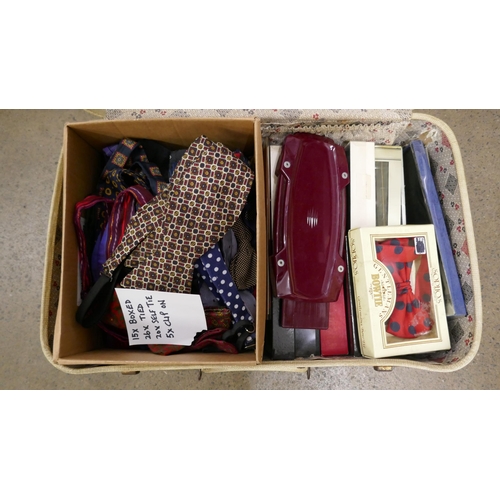 1113 - A large collection of bow ties, 15 boxed, 26 tied, 20 self tie and 5 clip-on, and a press **PLEASE N... 