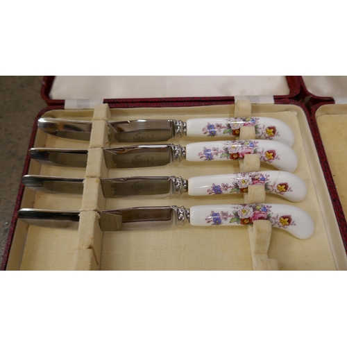 1121 - A Royal Crown Derby set of six patisserie forks in faux leather case, a Royal Crown Derby set of fou... 