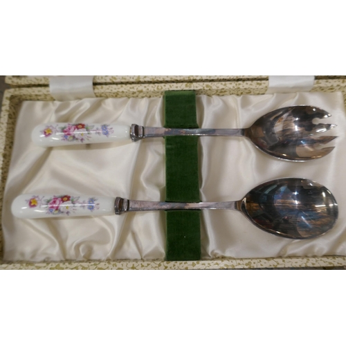 1121 - A Royal Crown Derby set of six patisserie forks in faux leather case, a Royal Crown Derby set of fou... 