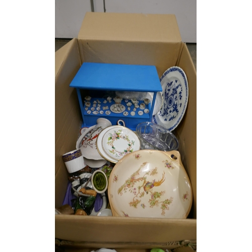 1127 - A collection of ceramics and other items including a Mintons blue and white plate, Toby jugs, doll's... 