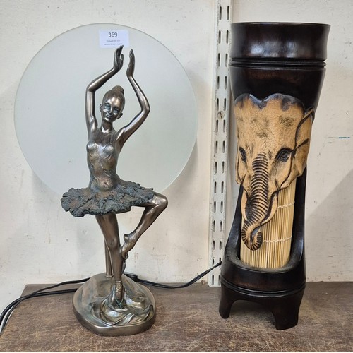 369 - An Art Deco style resin figural lamp of a ballerina and a carved carved wooden lamp, from Koh Samui