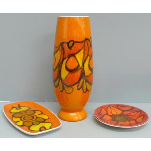 603 - A Poole Delphis vase and two dishes, vase 23.5cm